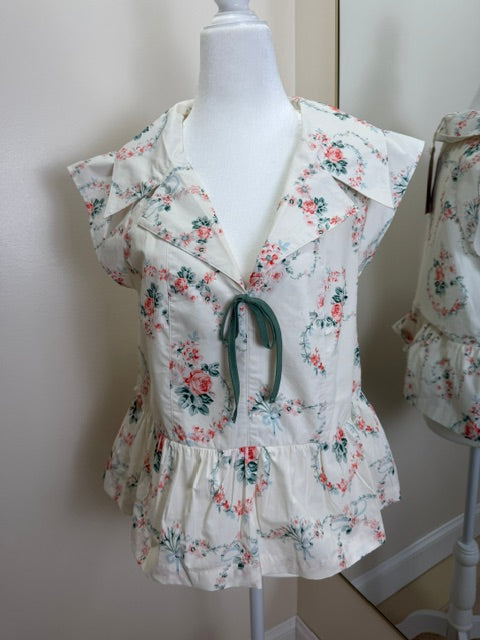 Floral peplum tie-front blouse