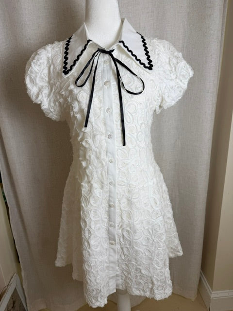 White button up mini dress with black trim