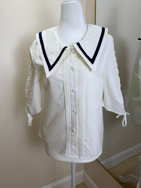 White blouse with sailor collar