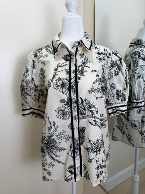 Tan and black floral blouse