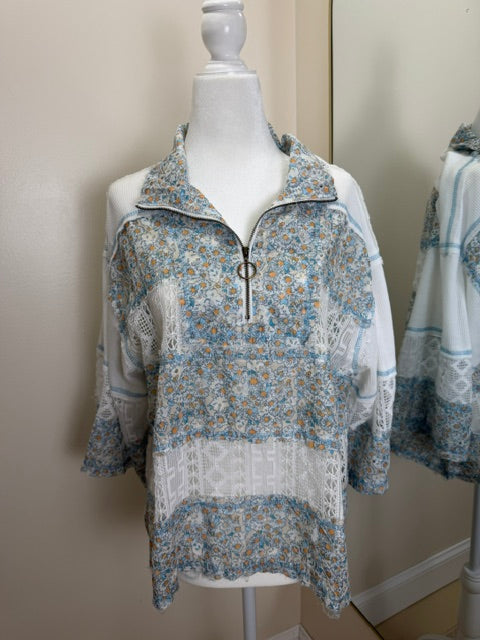 POL Blue floral quarter zip top