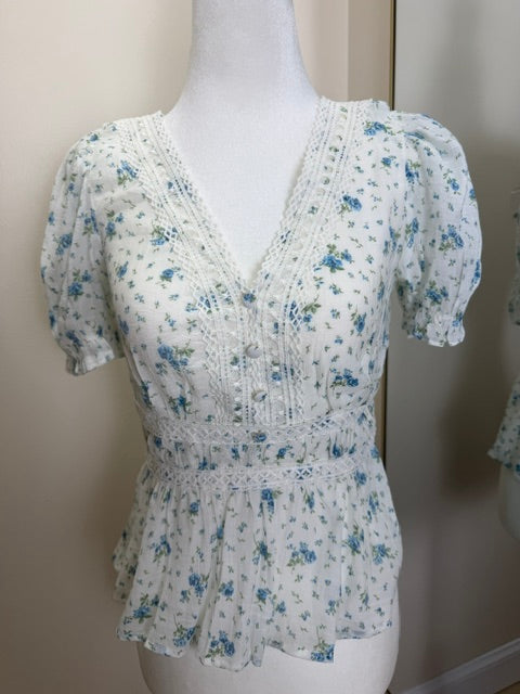 White and blue peplum top
